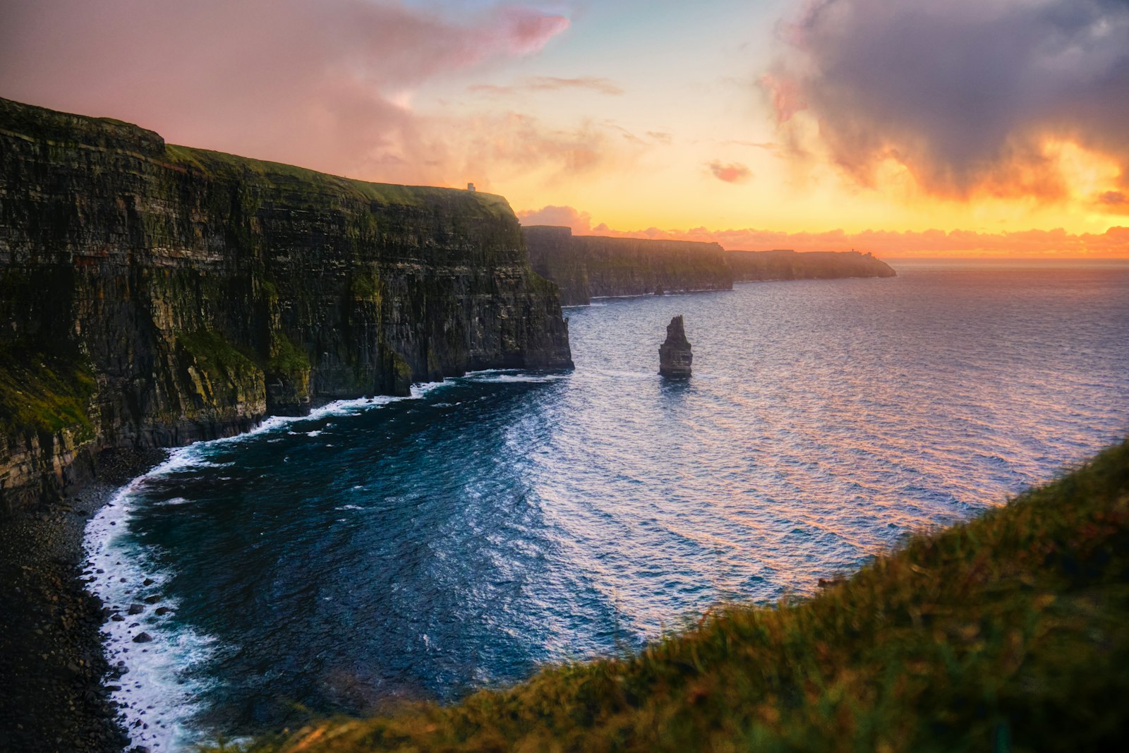 Cliffs of Moher tickets and cliffs of moher visitor centre on the Atlantic at dusk